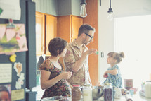 a family together in a kitchen 