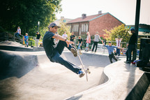 a man skateboarding in a skatepark 