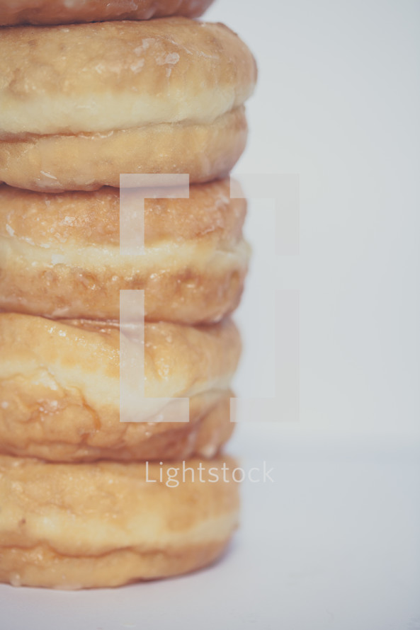 stacked donuts on a white background 