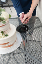Husband and Wife Cutting Cake