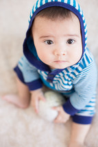 infant boy in a hoodie 