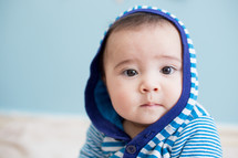 infant boy in a hoodie 