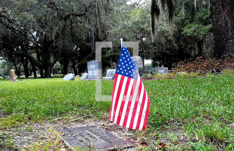 American flag at a grave site in a local cemetery. 