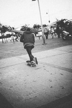 teen boy skateboarding 