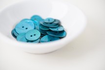 bowl of blue buttons 