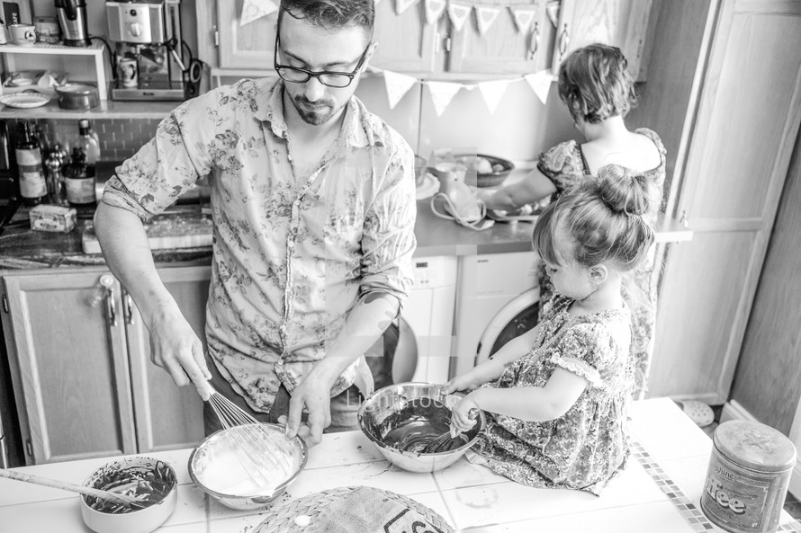 family baking in a kitchen 