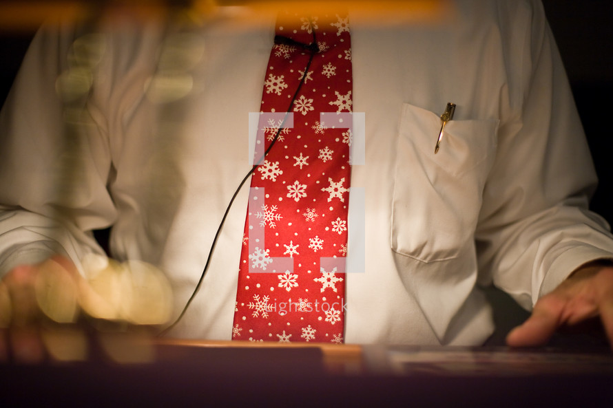 man wearing a snowflake tie 
