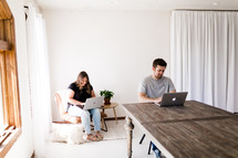 a man and woman working from home 