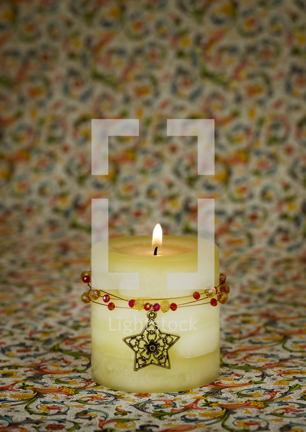 Christmas candle with jewels and star, Florentine illuminated manuscript background