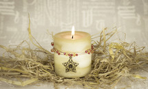 Christmas candle, Light of the world in straw with creamy text background