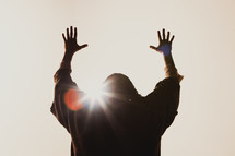 Jesus with his hands raised to God