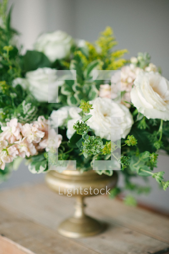 centerpiece, flowers in a vase on a table 