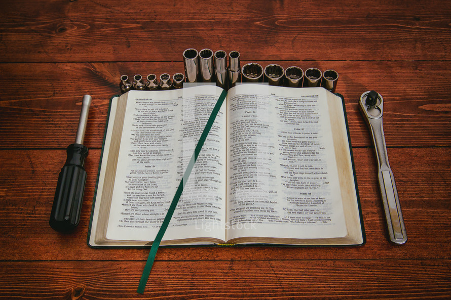 tools on a Bible 