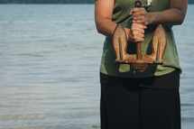 a woman holding an anchor 
