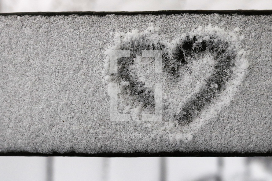 heart drawn in snow 