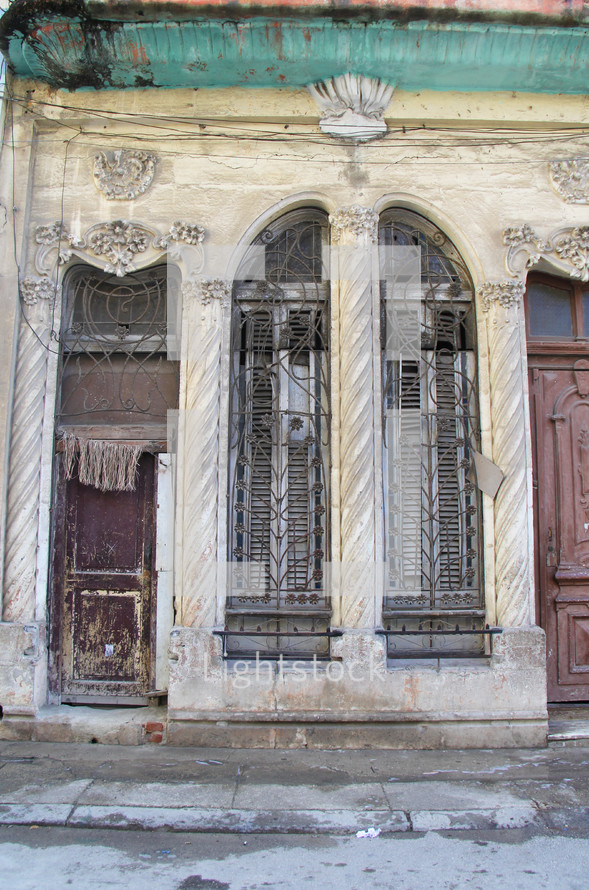 ornate bars over windows 