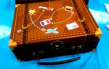 A well traveled piece of brown luggage from a missionary or world traveler going out to spread the gospel message to all the world. 