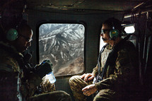 Soldiers in a helicopter
