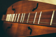 strings on a handmade dulcimer
