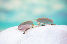 sunglasses on a towel 