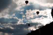 silhouettes of hot air balloons 