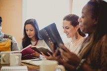 women reading Bibles at a woman's group Bible study 