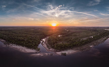 aerial view over a delta at sunset 