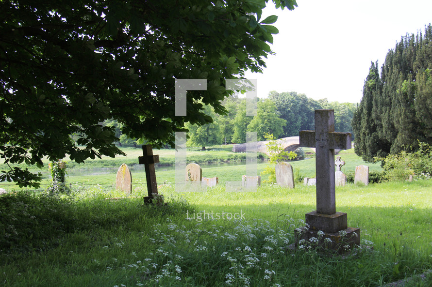cross tombstones in a cemetery 