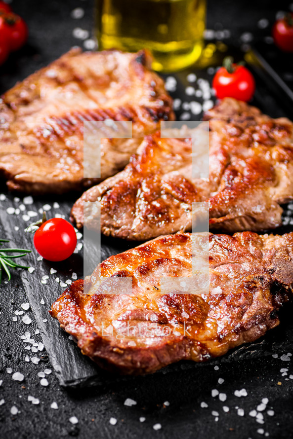 Grilled pork steak with rosemary. High quality photo