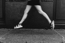 legs of a woman in a hurry 