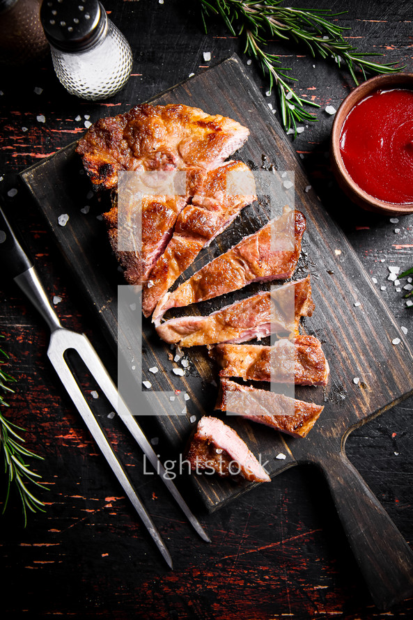 Grilled pork steak with rosemary. High quality photo