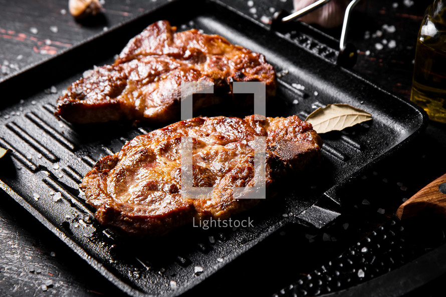 Grilled pork steak with rosemary. High quality photo