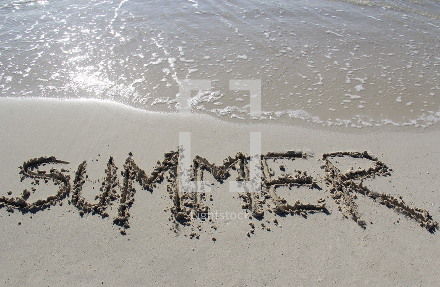 word summer written in the sand 