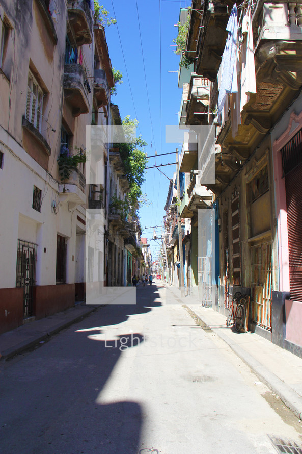 narrow street between buildings 
