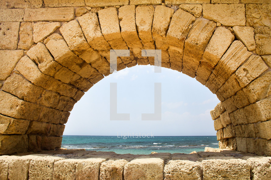 An arch of the ancient Roman aqueduct in what was Caesarea.