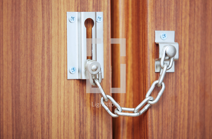 metal chain lock on a door 