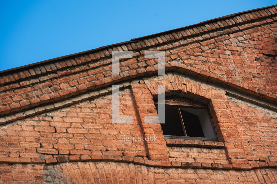 Red brick building and old window