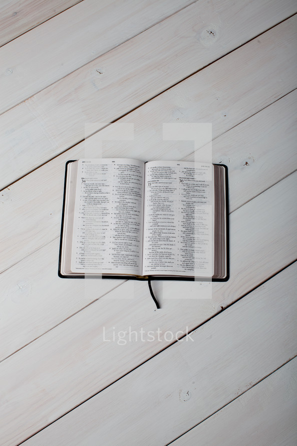 an open Bible on a table 
