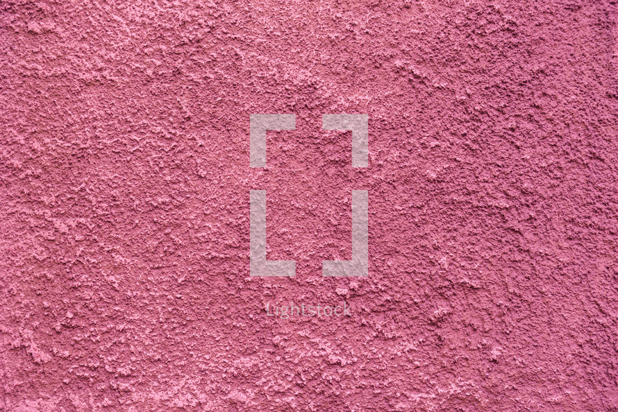 pink textured wall background 