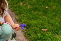 girl picking flowers 