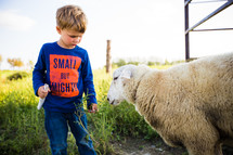 kids with a sheep 