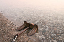 anchor lying on a shore