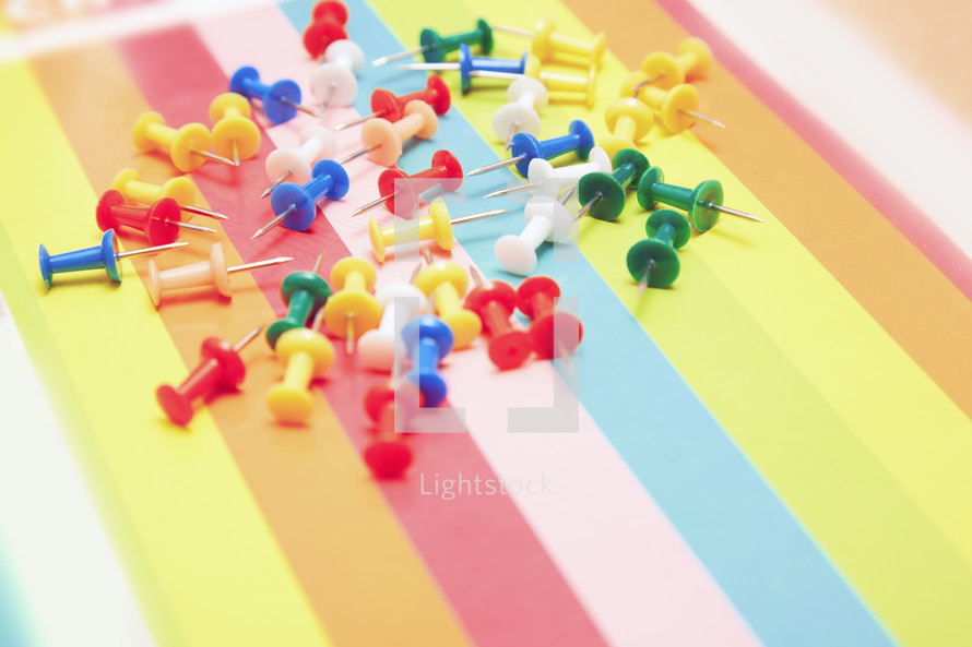 tacks on colored paper 