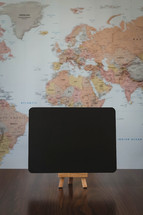 world map and blank sign 
