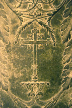 Bronze plaque with cross of Jesus and inscription in Greek.