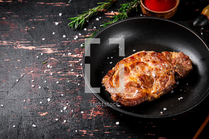 Grilled pork steak with rosemary. High quality photo