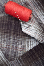 pocket and thread with needle 