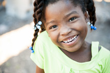 a smiling girl in the Dominican Republic