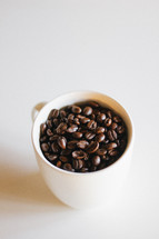 coffee beans in a mug 