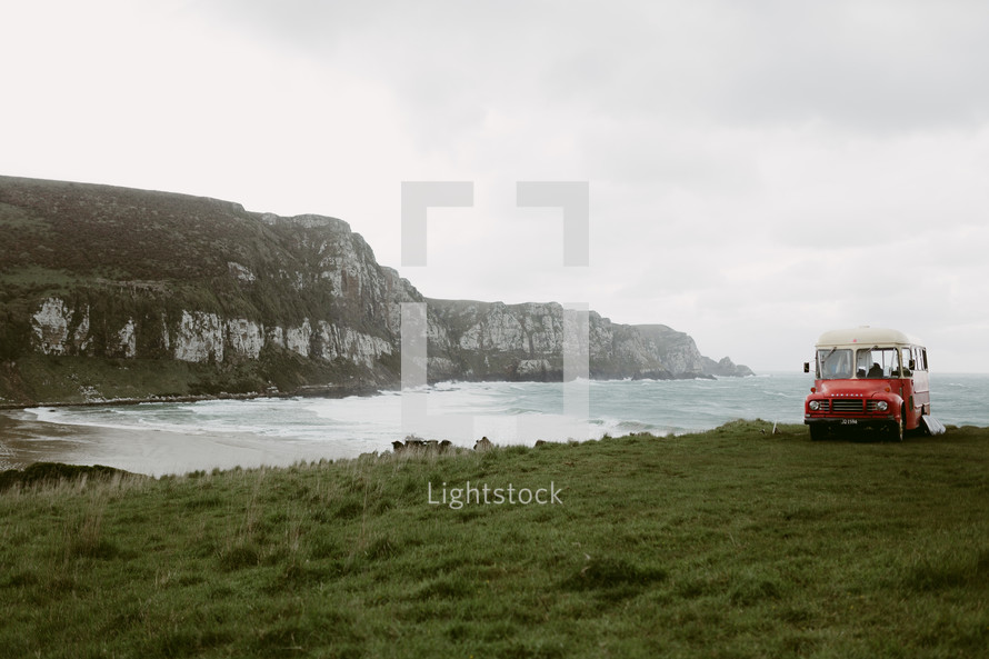 bus parked along the shores of New Zealand 